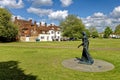 Elisabeth Frink\'s Walking Madonna Sculpture in Salisbury Cathedral Close, Wiltshire, United Kingdom