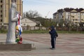 Elista, Russia: Buddhist complex Golden Abode of Buddha Shakyamuni in Kalmykia Great Hurul. Man praying in front of Royalty Free Stock Photo