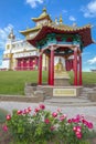 Gazebo with sculpture of Buddhist teacher Acharya Gunaprabha at the temple of Golden Abode of Buddha Shakyamuni. Elista Royalty Free Stock Photo