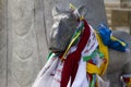 Elista, Russia: Saiga statue with color Buddhist prayful tags