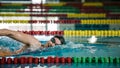 Elite female swimmer during a front crawl swimming training Royalty Free Stock Photo