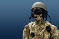 Elite member of Army rangers in helmet and dark glasses. Studio shot, dark black background, looking at camera, dark
