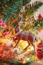 Elk and deer on the holiday tree, Christmas toy, life style Royalty Free Stock Photo