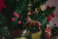 Elk and deer on the holiday tree, Christmas toy, life style Royalty Free Stock Photo