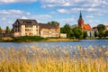 Panorama of Elk historic city center with church tower and Elk castle on shore of Jezioro Elckie lake in Masuria region of Poland