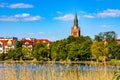 Panorama of Elk historic city center with Holiest Heart of Jesus on shore of Jezioro Elckie lake in Elk Town in Poland