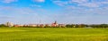 Panorama of Elk historic city center with neo-gothic church on shore of Jezioro Elckie lake in Elk town in Poland