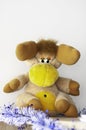 Elk toy made by plush with a white tinsel Royalty Free Stock Photo