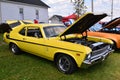 Yellow Yenko Chevrolet Nova with stripes Royalty Free Stock Photo