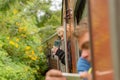 The Unspecific people had taking photo with moving train. The train was moving through the nine arches bridge at the Ella, Sri Lan Royalty Free Stock Photo