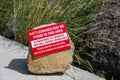 Wild Horse Wind Farm, visitor center walkway with red sign warning of rattlesnakes in the area