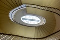 An elliptic staircase winding down an old building - 1 Royalty Free Stock Photo