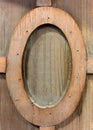 A elliptic type wooden frame on wood wall