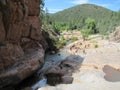 Ellison Creek waterfall in Arizona with people below Royalty Free Stock Photo