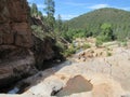 Ellison Creek waterfall in Arizona with people below Royalty Free Stock Photo