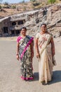ELLORA, INDIA - FEBRUARY 7, 2017: Local women visiting Jain caves in Ellora, Maharasthra state, Ind