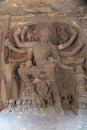 Faded stone carving of Lord Shiva in his manifestation as Kala Bhairava, Kailasa Temple, Ellora Caves, Aurangabad, India