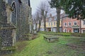 Elm Hill cobbled street with medieval houses from the Tudor period with St Simon and St Jude Chuch on the left Royalty Free Stock Photo