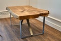 Live edge elm slab coffee table. Woodworking and carpentry production. Furniture manufacture Royalty Free Stock Photo