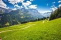 Elm village and Swiss mountains - Piz Segnas, Piz Sardona, Laaxer Stockli from Ampachli, Glarus, Switzerland, Europe