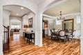 Luxurious entryway looking through a large house.