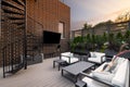 A backyard patio of a brick home at sunset. Royalty Free Stock Photo