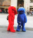 Elmo and Cookie Monster working in NY