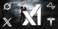 Elon Musk and the logos of XAI, Grok, Tesla, Twitter, Neuralink