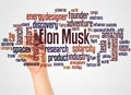 Elon Musk word cloud and hand with marker concept