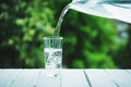 A elongated glass filled with clean drinking water. Royalty Free Stock Photo