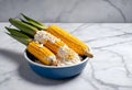 elote, mexican grilled corn on the cob seasoned with sour cream