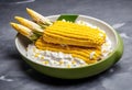 elote mexican grilled street corn on the cob slathered with sour cream
