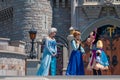 Elsa, Anna and Minnie on Mickey`s Royal Friendship Faire on Cinderella Castle in Magic Kingdom .