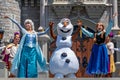 Elsa, Anna and Olaf on Mickey`s Royal Friendship Faire on Cinderella Castle in Magic Kingdom .