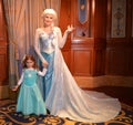 Elsa and beautiful girl - Disney movie Frozen - Magic Kingdom Royalty Free Stock Photo
