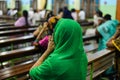 Women praying jesus with bible in church pastor and people praying god in church Royalty Free Stock Photo