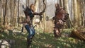 An elven girl archer and a formidable giant orc prepare for battle.. Fantasy medieval concept. 3D Rendering.