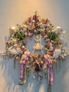 Elves in christmas wreath. Romantic Christmas and Advent Wreath with balls, flowers, elves in pastel shades