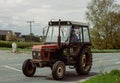Ely, Cambridgeshire-UK: April 2023: Old Zetor tractor being driven on busy main road.