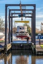 ELY, CAMBRIDGESHIRE/UK - NOVEMBER 23 : Boat cleaning in Ely on N Royalty Free Stock Photo