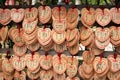 Ema with heart shape in Kuzuharaoka shrine. Ema are small wooden plaques, common to Japan, in which Shinto and Buddhist worshipper