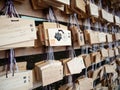 Ema are small wooden plaques on which Shinto worshippers write their prayers or wishes Royalty Free Stock Photo