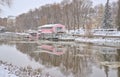 Emagoji river with pink colored boat in tartu