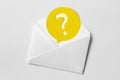 Email envelope with question mark speech bubble on white background