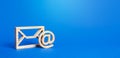 Email figure on blue background. Envelope and AT commercial sign symbol. Concept of email address. Contacts and communication.