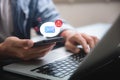 Email hacked warning alert notification, junk mail, scam malware spreading virus on message alert virtual on smartphone. potential