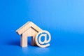 Email icon and house. Contacts for business, home page, home address. communication on Internet. Internet and global communication Royalty Free Stock Photo