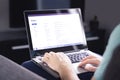 Email inbox on laptop screen. List of messages. Man checking received e mail. Spam, junk and digital marketing. Read, reply. Royalty Free Stock Photo