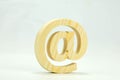 Email made of wooden pine symbol on white background