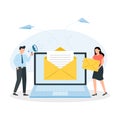 Email message on screen in laptop. Man and woman holding envelopes. E-mail marketing concept Royalty Free Stock Photo